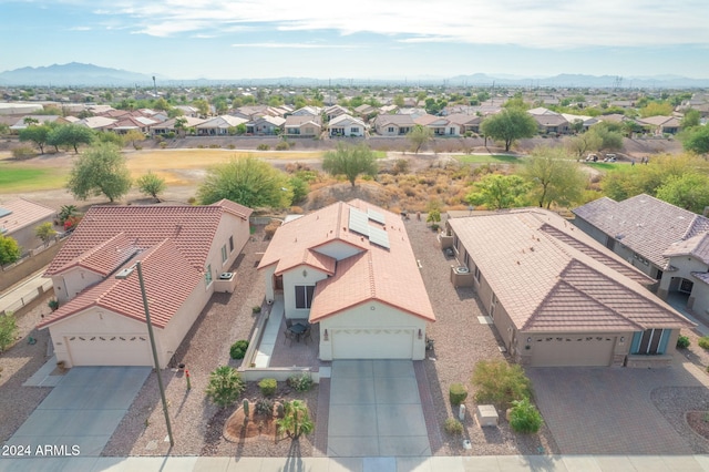 drone / aerial view featuring a mountain view