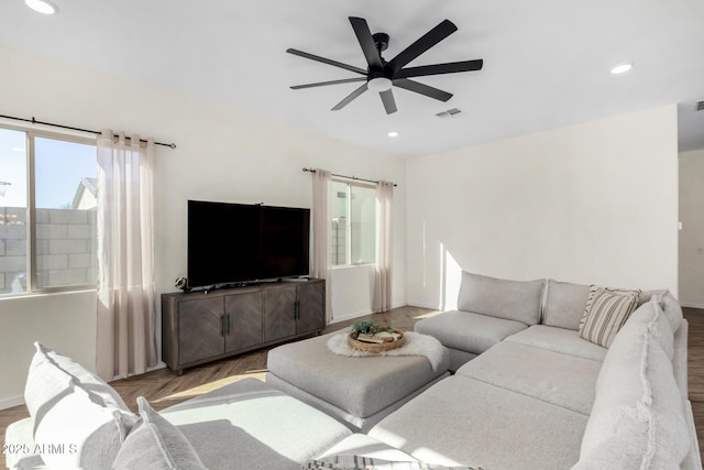 living room featuring ceiling fan