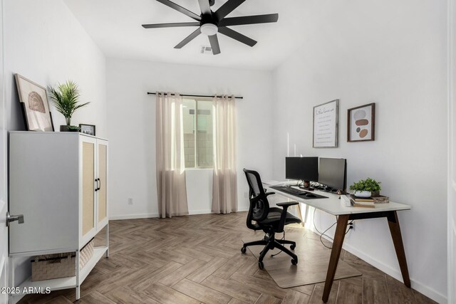 office featuring ceiling fan and light parquet floors