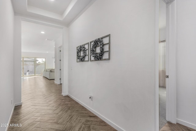 hall featuring parquet floors