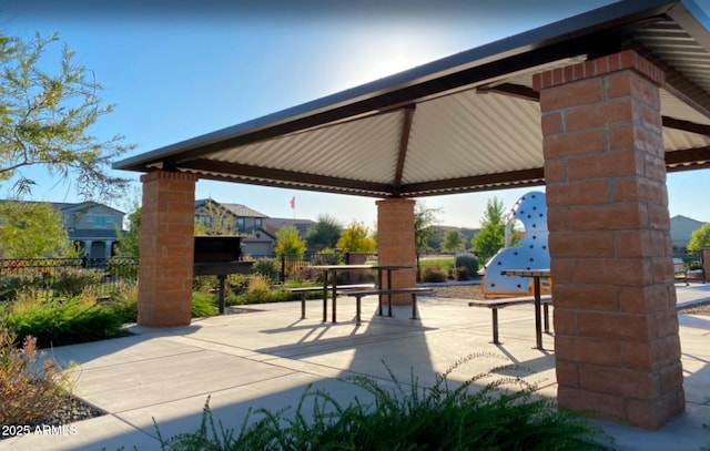 view of property's community featuring a gazebo and a patio