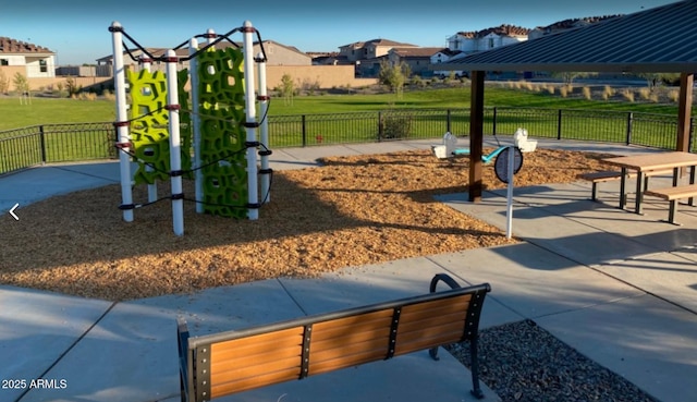 view of property's community with a gazebo and a playground