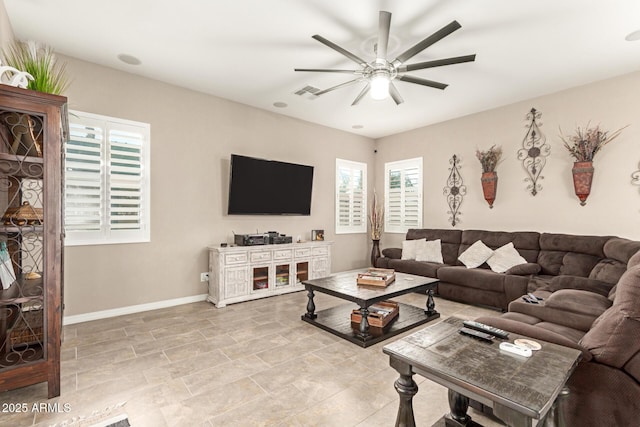 living room with ceiling fan