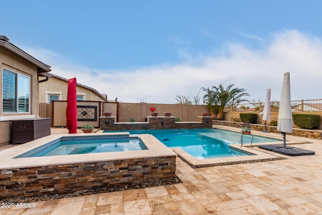 view of pool featuring an in ground hot tub and a patio area