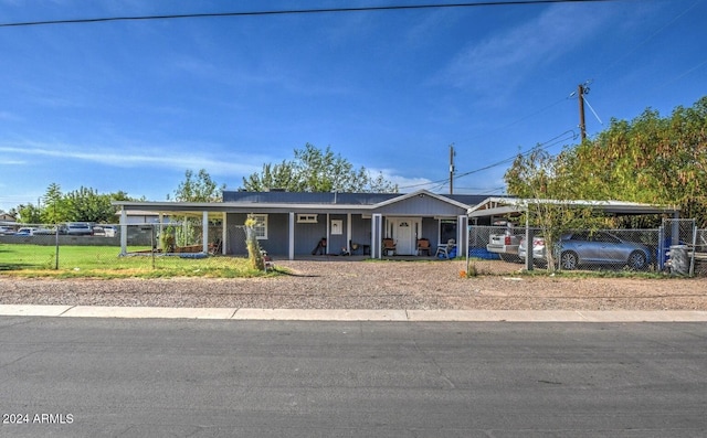 single story home with a porch