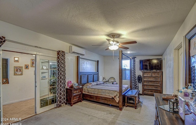 carpeted bedroom with vaulted ceiling, ceiling fan, a wall mounted air conditioner, and a textured ceiling