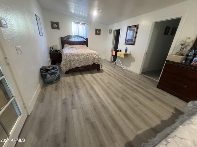 bedroom featuring light hardwood / wood-style floors