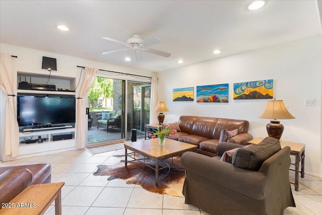 living area featuring light tile patterned floors, a ceiling fan, and recessed lighting