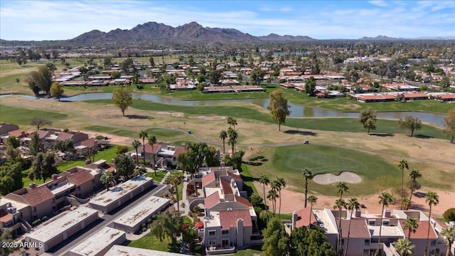 bird's eye view with golf course view, a residential view, and a water and mountain view