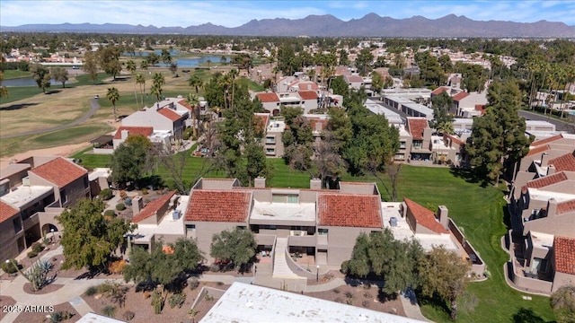 bird's eye view with a residential view and a water and mountain view