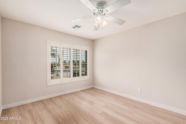 3582 N 160th Ave, Goodyear, AZ 85395 - spare room featuring light wood-style flooring, baseboards, and ceiling fan