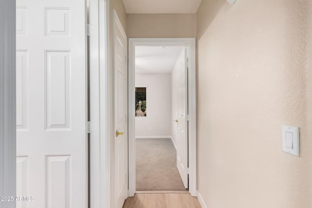 3582 N 160th Ave, Goodyear, AZ 85395 - hallway featuring baseboards and light wood finished floors