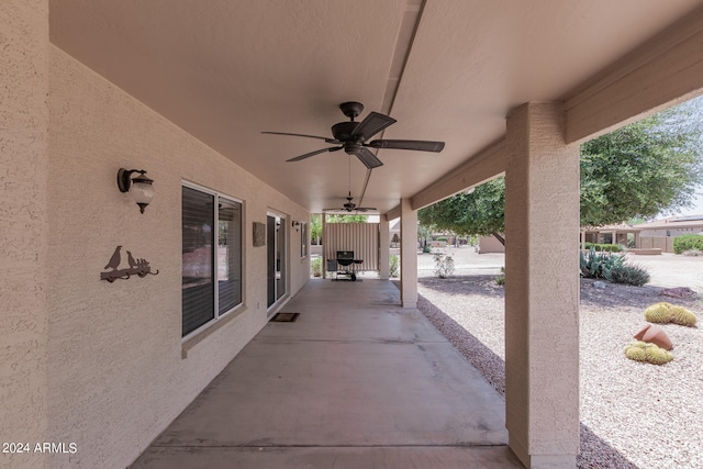 view of patio featuring ceiling fan