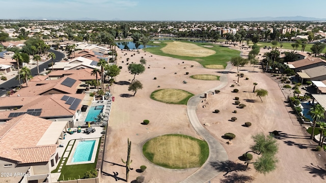 3582 N 160th Ave, Goodyear, AZ 85395 - aerial view of property and surrounding area with nearby suburban area, a golf course, a pool area, and a nearby body of water