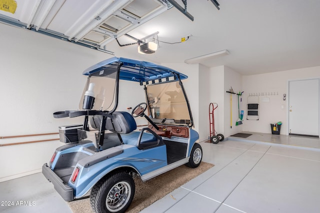 garage featuring a garage door opener