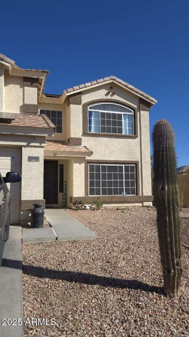 view of front of property featuring stucco siding