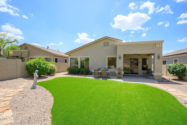 5014 E Kirkland Rd, Phoenix, AZ 85054 - rear view of property with ceiling fan, stucco siding, and a patio area