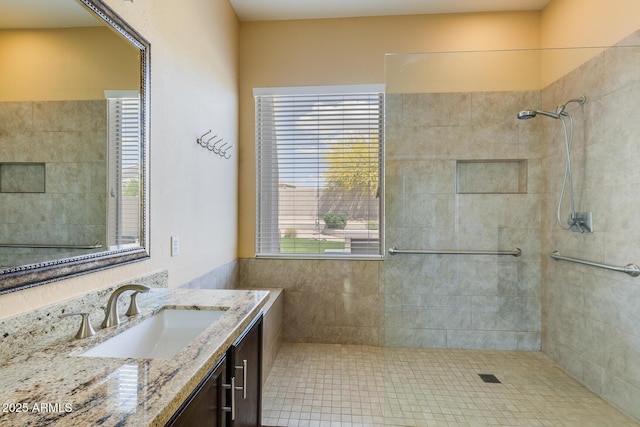 5014 E Kirkland Rd, Phoenix, AZ 85054 - full bathroom featuring tiled shower and vanity