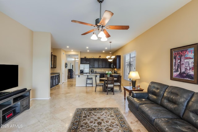 5014 E Kirkland Rd, Phoenix, AZ 85054 - living room featuring a ceiling fan, a chandelier, recessed lighting, and baseboards