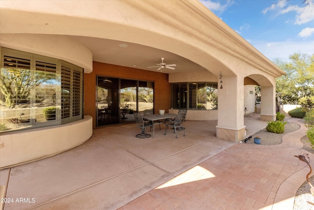 view of patio featuring ceiling fan