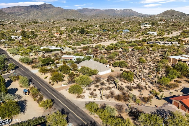 birds eye view of property with a mountain view