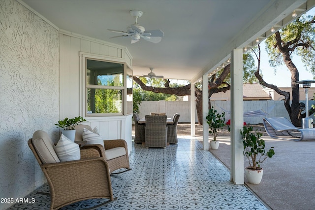 view of patio with ceiling fan