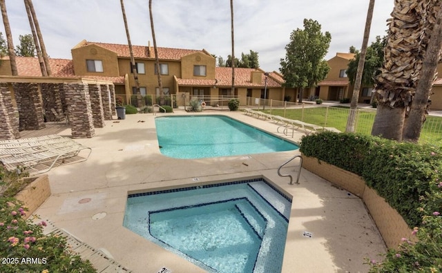 3511 E Baseline Rd Unit 1235, Phoenix, AZ 85042 - community pool featuring a community hot tub, fence, and a patio area