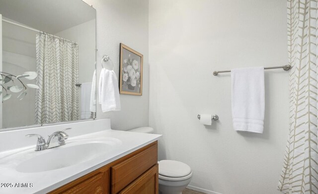3511 E Baseline Rd Unit 1235, Phoenix, AZ 85042 - bathroom with toilet, vanity, and a shower with curtain