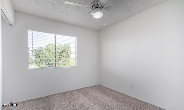 3511 E Baseline Rd Unit 1235, Phoenix, AZ 85042 - unfurnished room with carpet, a textured ceiling, a ceiling fan, and baseboards