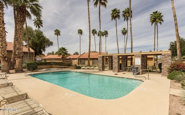 3511 E Baseline Rd Unit 1235, Phoenix, AZ 85042 - community pool featuring a patio