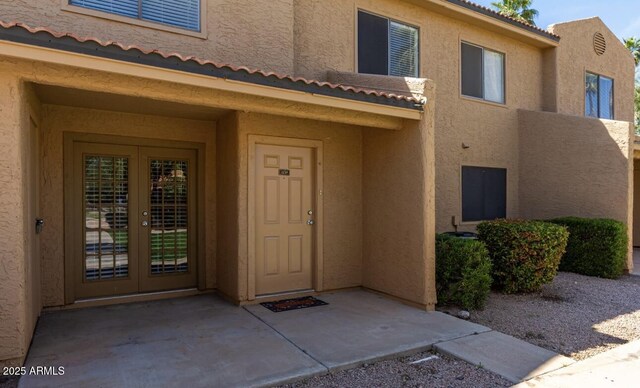 3511 E Baseline Rd Unit 1235, Phoenix, AZ 85042 - entrance to property featuring stucco siding and a tiled roof