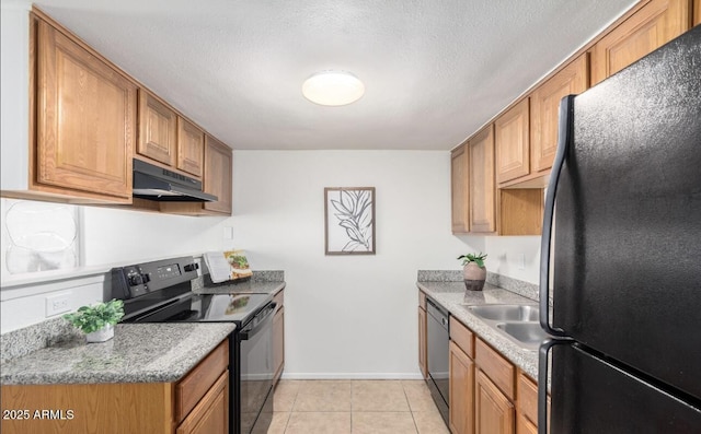 3511 E Baseline Rd Unit 1235, Phoenix, AZ 85042 - kitchen featuring black appliances, under cabinet range hood, baseboards, and brown cabinets