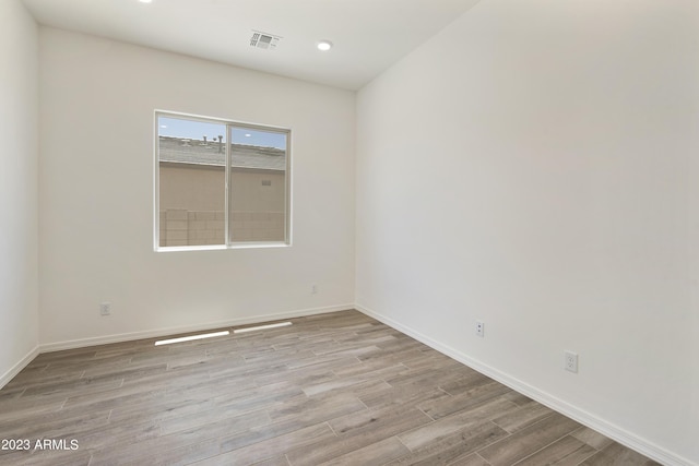 empty room with light wood-type flooring