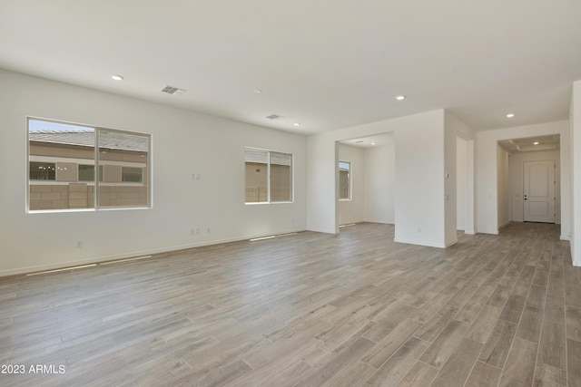 unfurnished room featuring light hardwood / wood-style flooring