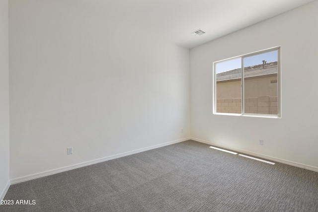 spare room with carpet flooring