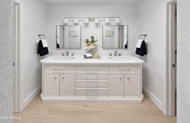 bathroom featuring tile patterned floors and vanity