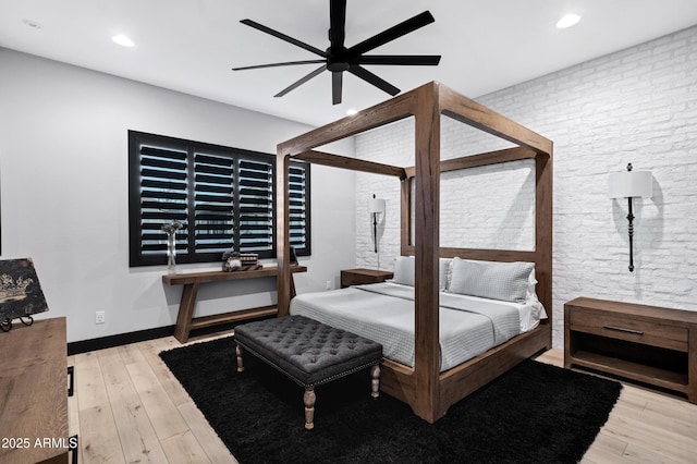 bedroom featuring recessed lighting, wood finished floors, and ceiling fan