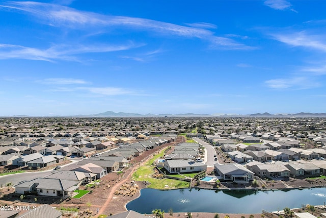 aerial view featuring a residential view and a water and mountain view