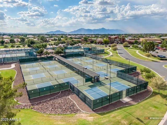 birds eye view of property featuring a mountain view