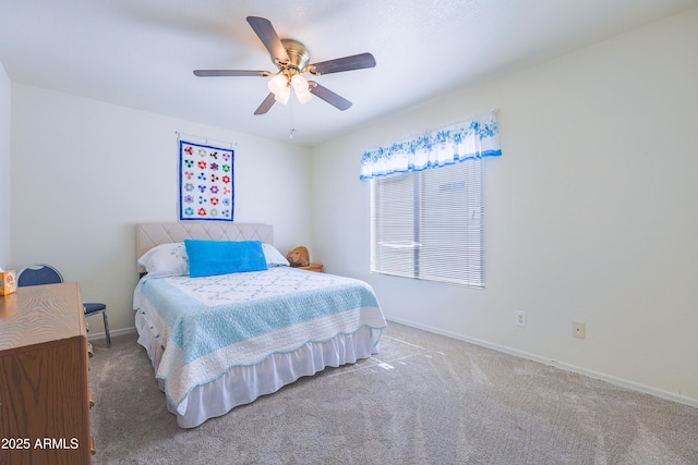 bedroom with carpet floors, a ceiling fan, and baseboards