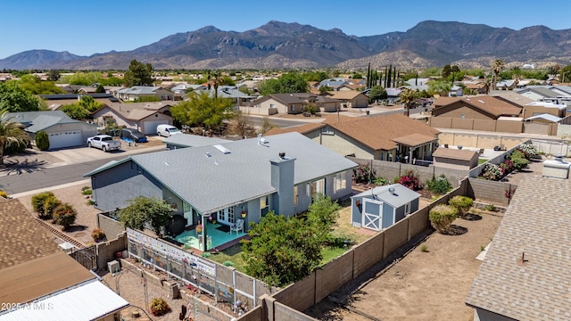 birds eye view of property with a residential view and a mountain view