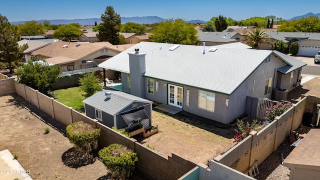 bird's eye view featuring a residential view and a mountain view