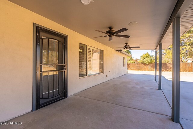 view of patio featuring ceiling fan