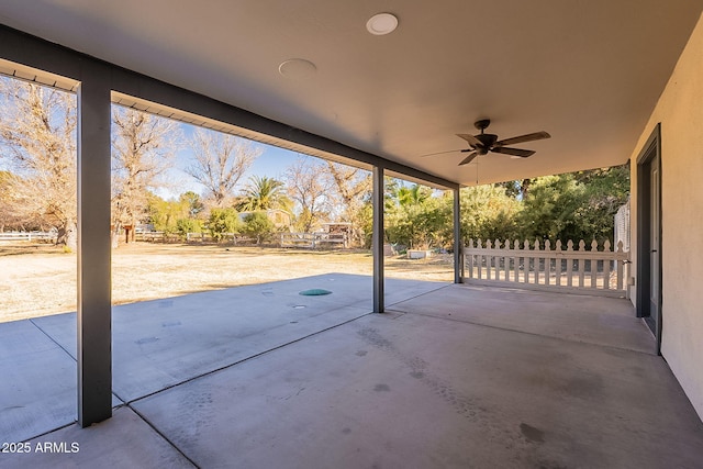 view of patio featuring ceiling fan