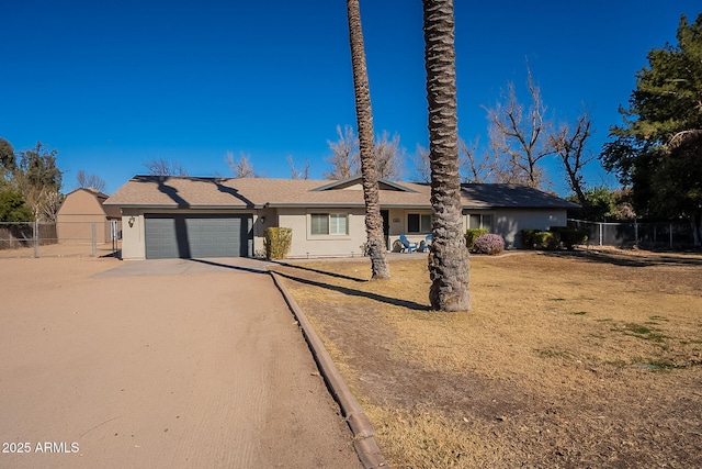 single story home with a garage