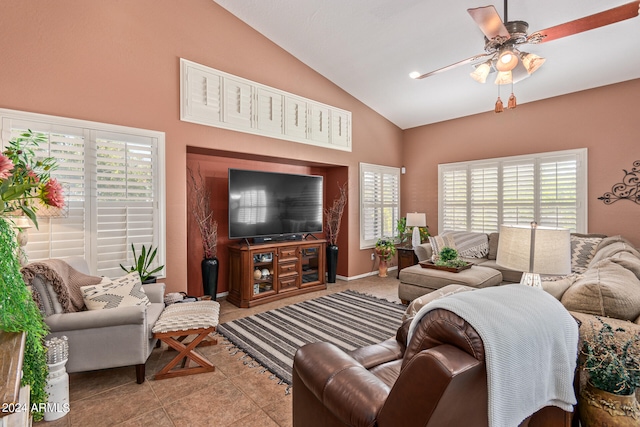 tiled living room with lofted ceiling and ceiling fan