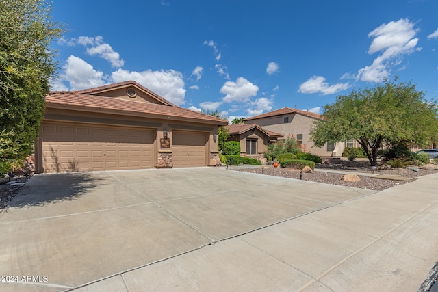 view of front of home with a garage