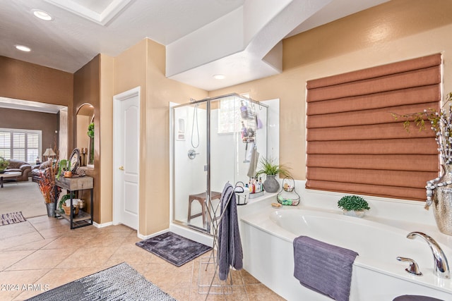 bathroom with plus walk in shower and tile patterned floors