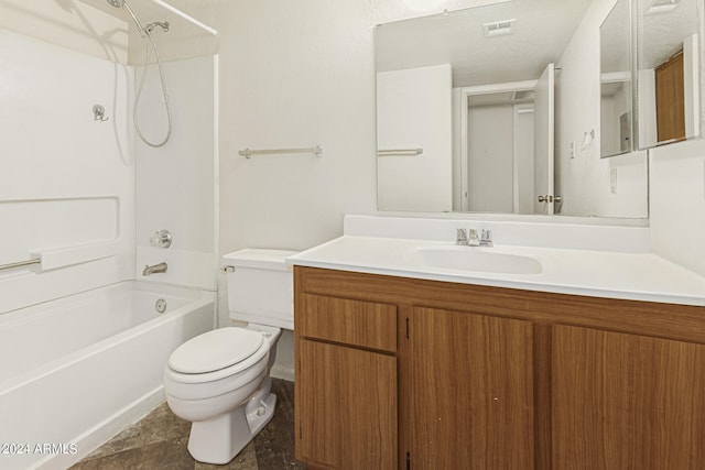 full bathroom featuring vanity, bathing tub / shower combination, and toilet