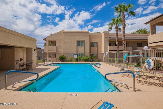 view of pool with a patio area